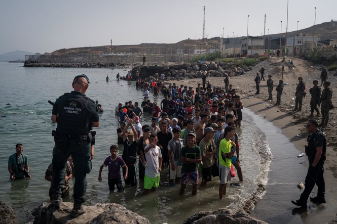 Spanish police ‘identify multiple suspected jihadists’ among 60,000 migrants who stormed border into Ceuta