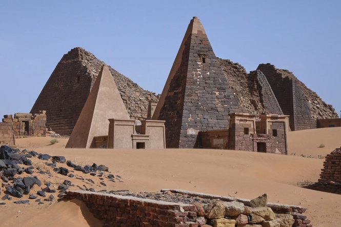 War and accumulating sand threaten Sudan’s Meroe pyramids, in photos