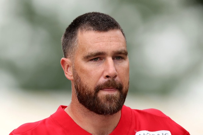 Travis Kelce’s coach defends ‘dad body’ claims after wedding to Taylor Swift