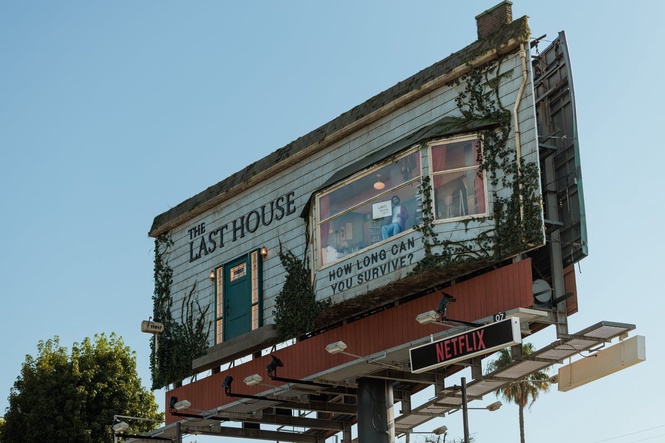 How much would they have to pay you? Netflix has man living in LA billboard to promote new movie