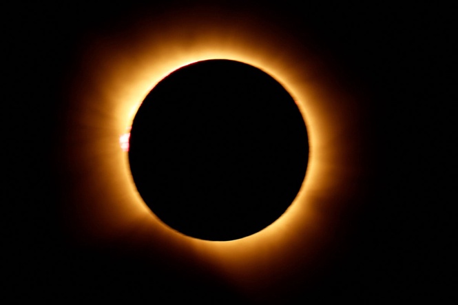 Stunning solar eclipse photos as millions of people are treated to rare celestial display