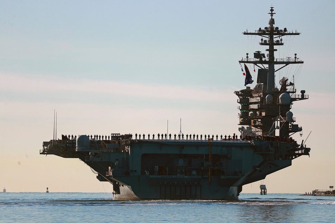 US top Middle East commander visits deployed aircraft carrier, and other Mideast news