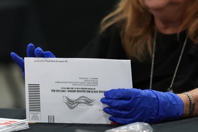 Judge lifts block on Trump’s mail voting restrictions ahead of midterms