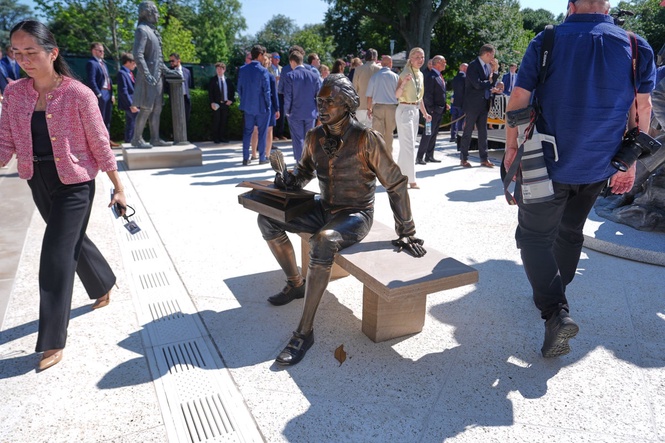 Inside Trump's remake of the White House Rose Garden. First a stone patio, then statues