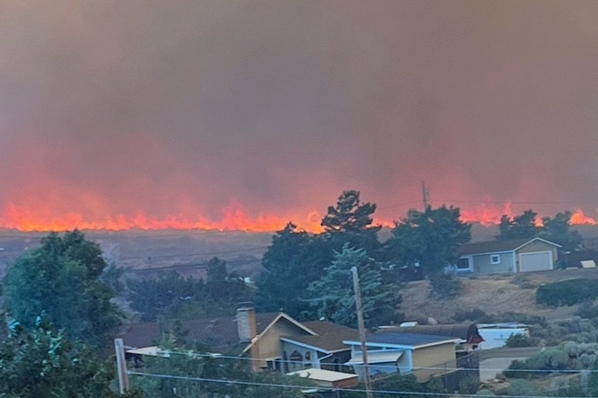 Wildfire approaches Reno, Nevada, forcing thousands to evacuate their neighborhoods