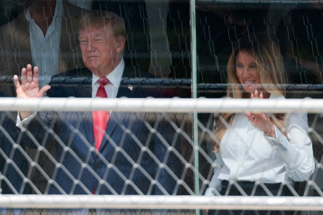 Donald Trump joined by Melania in rare public outing for IndyCar Grand Prix