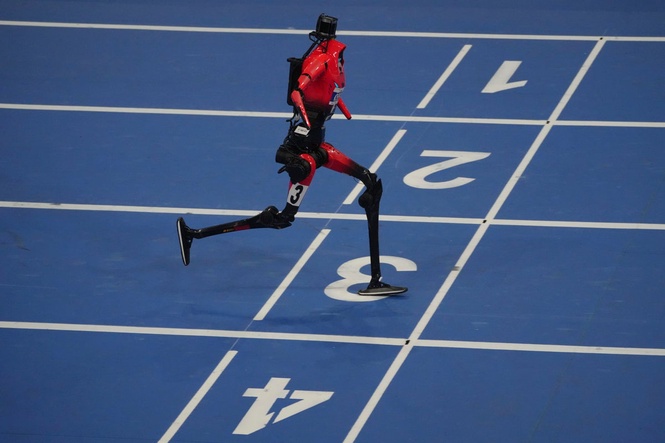 Humanoid robots sprint, play soccer and set records at Beijing games, in photos