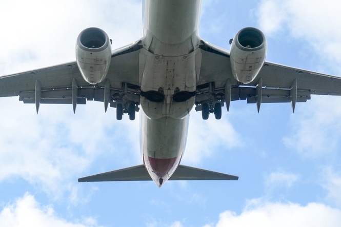 Unidentified body found in wheel well of flight from Japan