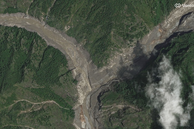 New satellite images show China-Nepal border crossing completely wiped out in flash floods