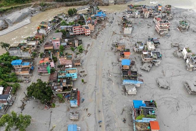 Bodies wash up in neighbouring India and as far as 250 miles downstream from Nepal disaster