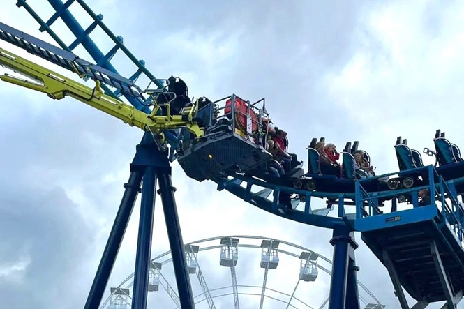 Thrill-seekers rescued from rollercoaster that stopped 50ft in the air