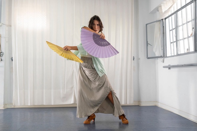 Old-fashioned hand fans make a comeback as Spain swelters, in photos