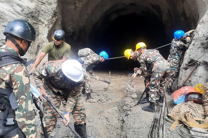 Dozens of trapped workers could still be alive in ‘room-like’ structures inside Nepal’s tunnels, officials say