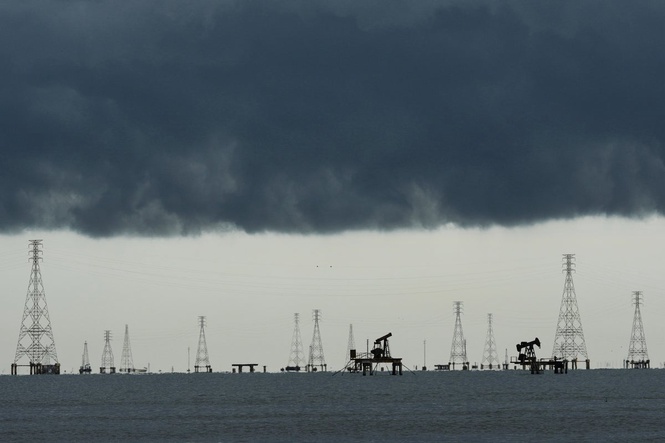 Photos show broken oil infrastructure and blackouts on Venezuela's Lake Maracaibo