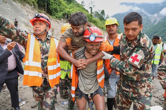 ‘Miracle’ in Nepal as two men rescued after voices heard coming from flooded tunnel