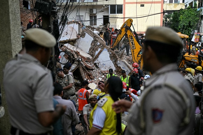 At least seven dead and dozens feared trapped after student housing collapses in Delhi