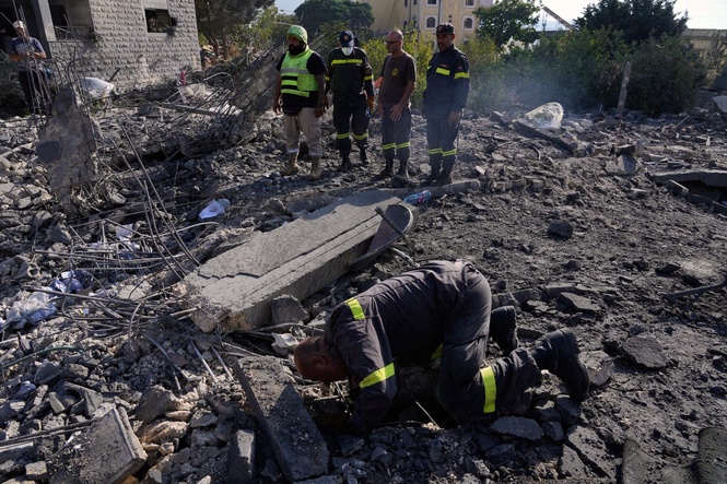 Israeli airstrikes on a village in southern Lebanon kill 9 people, wound 13