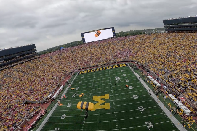 On-board with the Golden Knights parachute team as they land in America’s biggest stadium for football game