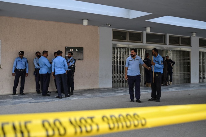 Pakistan hospital where 14 babies died in blaze had locked doors and no fire alarms, report finds