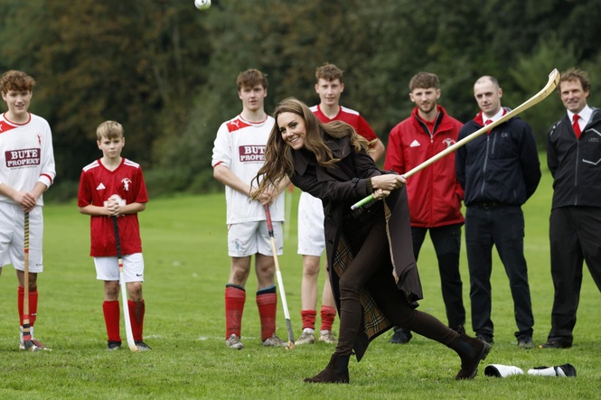 William and Kate get to grips with shinty during visit to Bute
