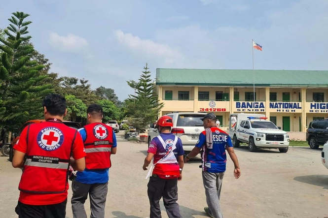 Three dead and eight injured in shooting at southern Philippines school, police say