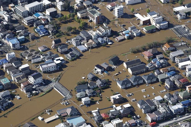 Four dead as Typhoon Dujuan leads to torrential rain and 1.5 million evacuations in Japan