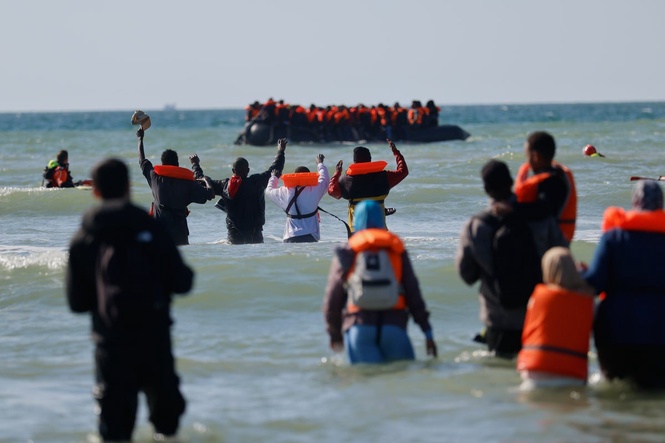 Far-right UK activist arrested after migrant dinghy slashed in the English Channel