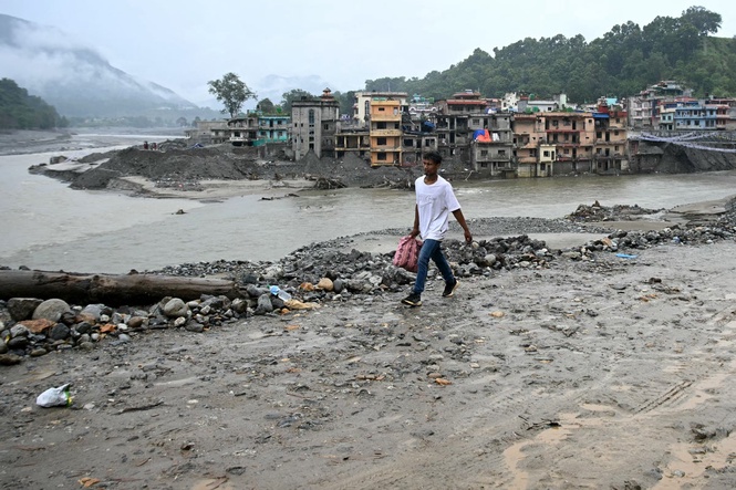 Nepal paying ‘colossal price’ for climate crisis after deadly floods