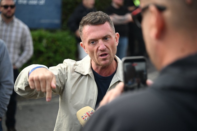 Danny Tommo pleads not guilty to criminal damage as Tommy Robinson turns up outside court