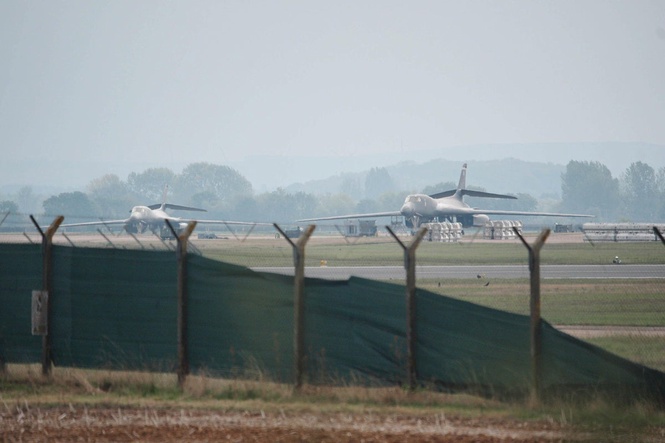 Counter-terrorism police leading inquiry after explosive arrests near RAF base