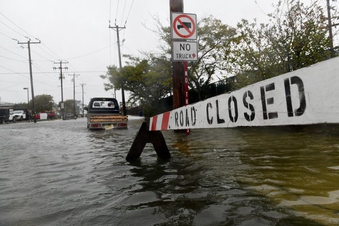 Worker killed as slow-moving nor’easter batters East Coast for third day