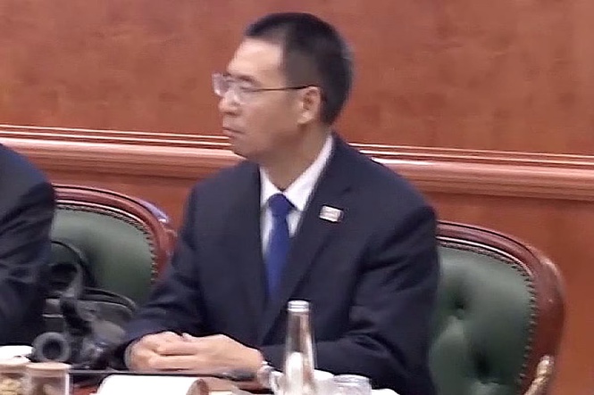 Mysterious figure alongside Xi Jinping identified after years of speculation – thanks to White House guestlist