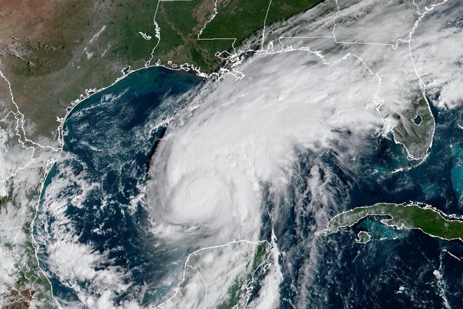 Georgia-Alabama showdown is on schedule despite approach of Hurricane Isaias; Trump will skip game