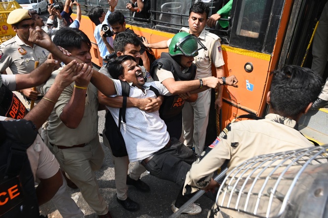 Opposition leaders, activists and journalists detained as Delhi police block ‘cockroach’ protests