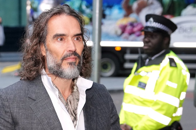Russell Brand arrives at court for start of rape and sexual assault trial