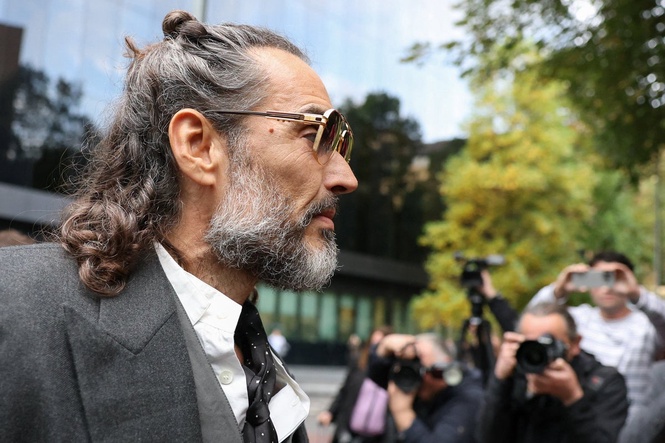 Russell Brand ‘raped woman after asking her to take photos of him’, court told