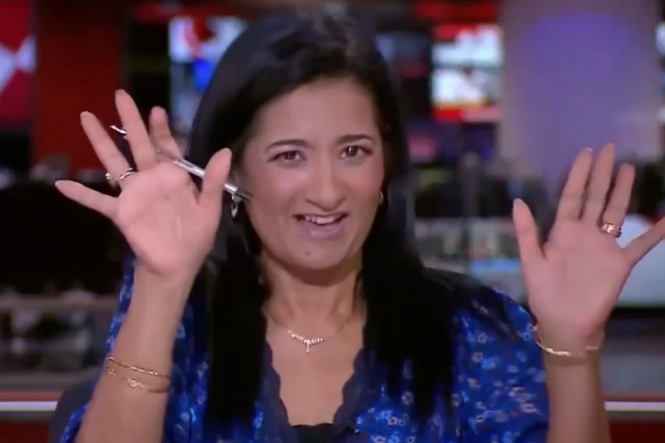 Flusthered BBC presenter flustered after walking off camera while not realising ...