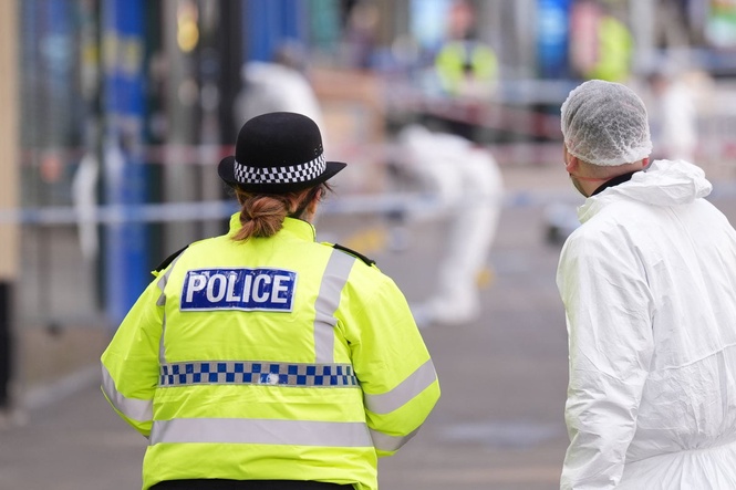 Police seek two suspects after officer shot in Nottingham city centre