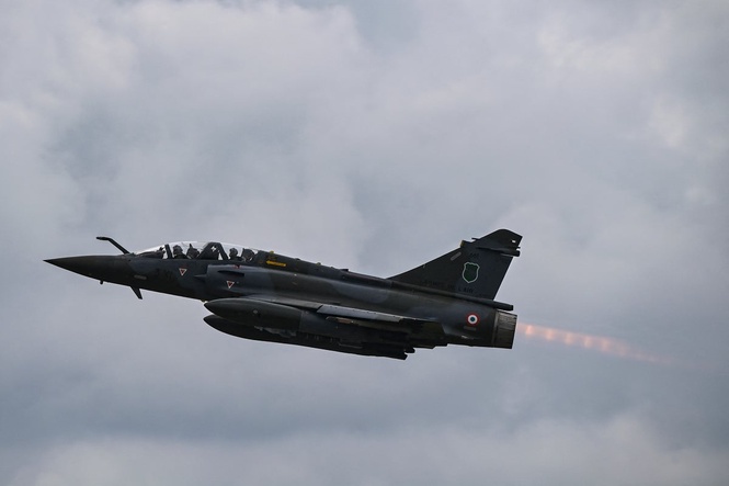 Fighter jet crashes and explodes into fireball in France with one dead and search launched for missing crew member