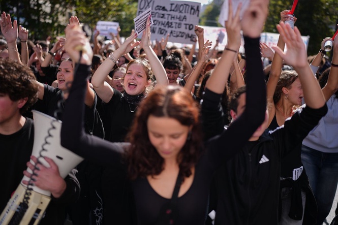Thousands of students and teachers march through Greek capital to protest high cost of living