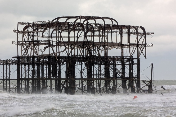 Part of historic Brighton pier collapses as storms bring heavy disruption