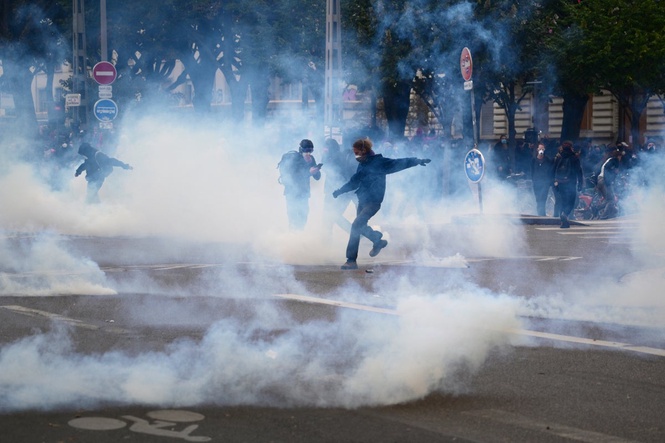 France protests latest: 135 arrested and tear gas fired at demonstrators as unrest erupts