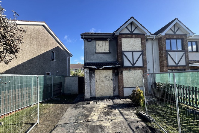 Man arrested in connection with fatal house fire released
