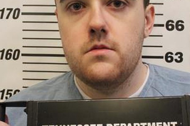 Man serving a life sentence for murder slips through a fence and escapes a Tennessee prison