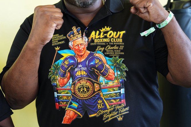 Charles tickled by boxing club’s T-shirt depicting him as king of the ring