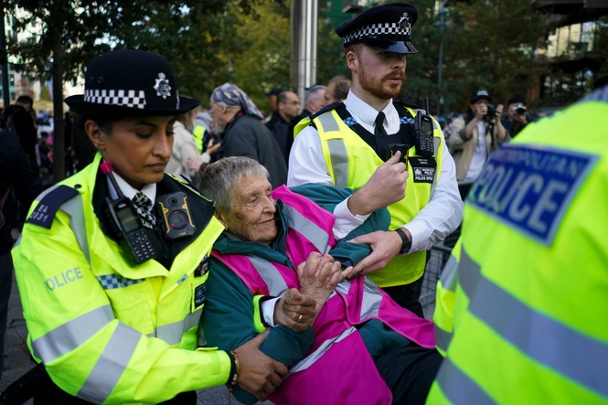 Over 100 protesters arrested outside US Embassy in London