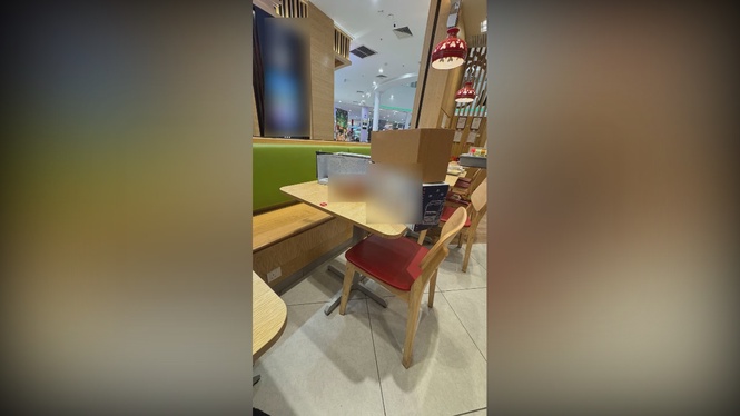 Image from: Messy diners under fire for leaving toy packaging all over restaurant table