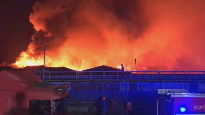 Image from: About 200 houses razed in Sandakan water village fire