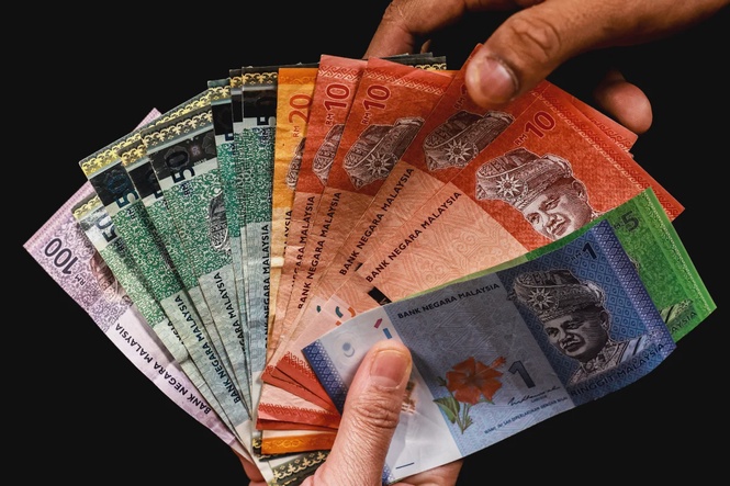 Image from: Ringgit opens lower against US dollar amid safe-haven demand