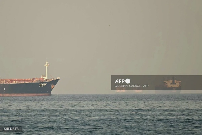 Image from: Trade ships hit in Hormuz as Iran reopening falters
